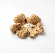 Maca root on a wooden surface